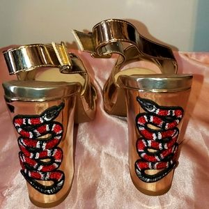 Metallic gold heel with snake heel